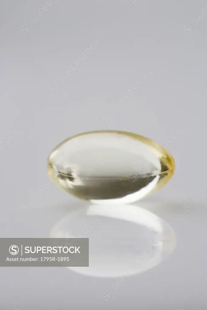 One gelcap and its reflection