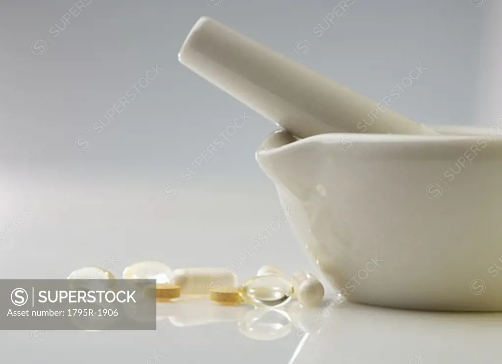 Pills with mortar and pestle