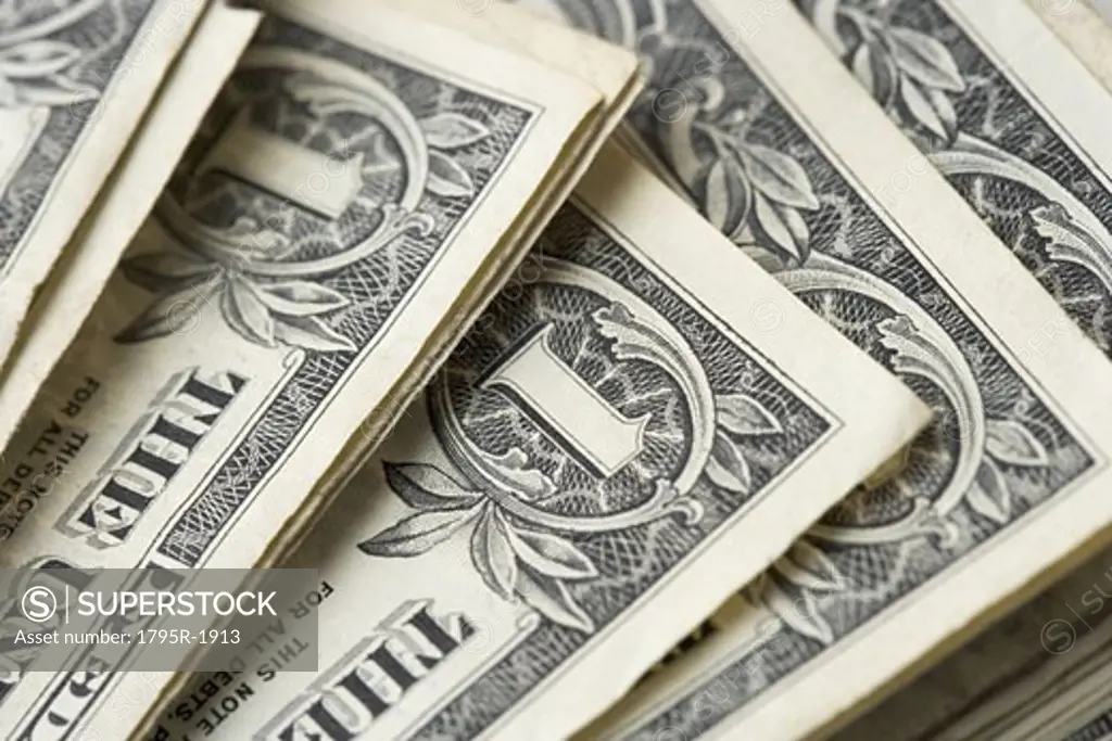 Closeup of stack of dollar bills