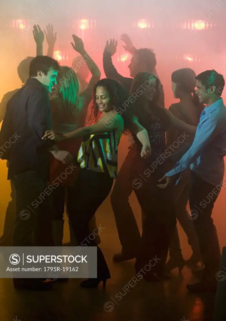 People dancing in nightclub