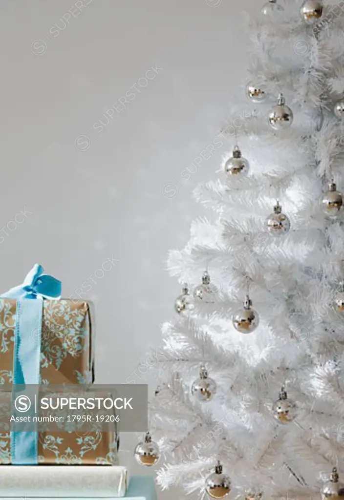 Gifts and white Christmas tree