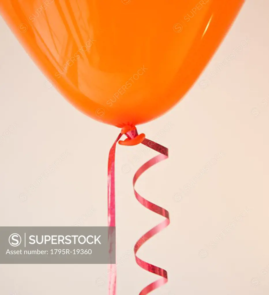 Orange balloon and ribbon