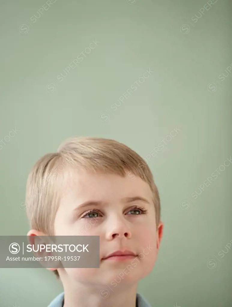 Portrait of boy looking up