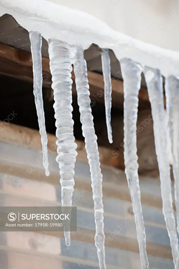 Icicles hanging from roof eaves
