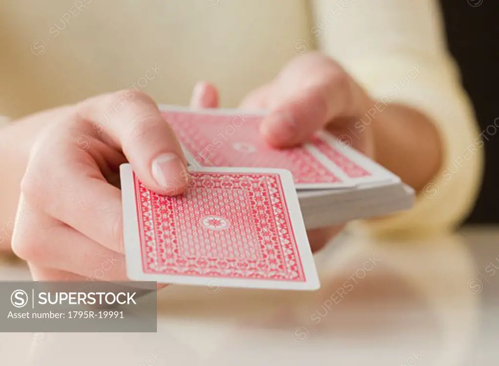 Woman dealing cards