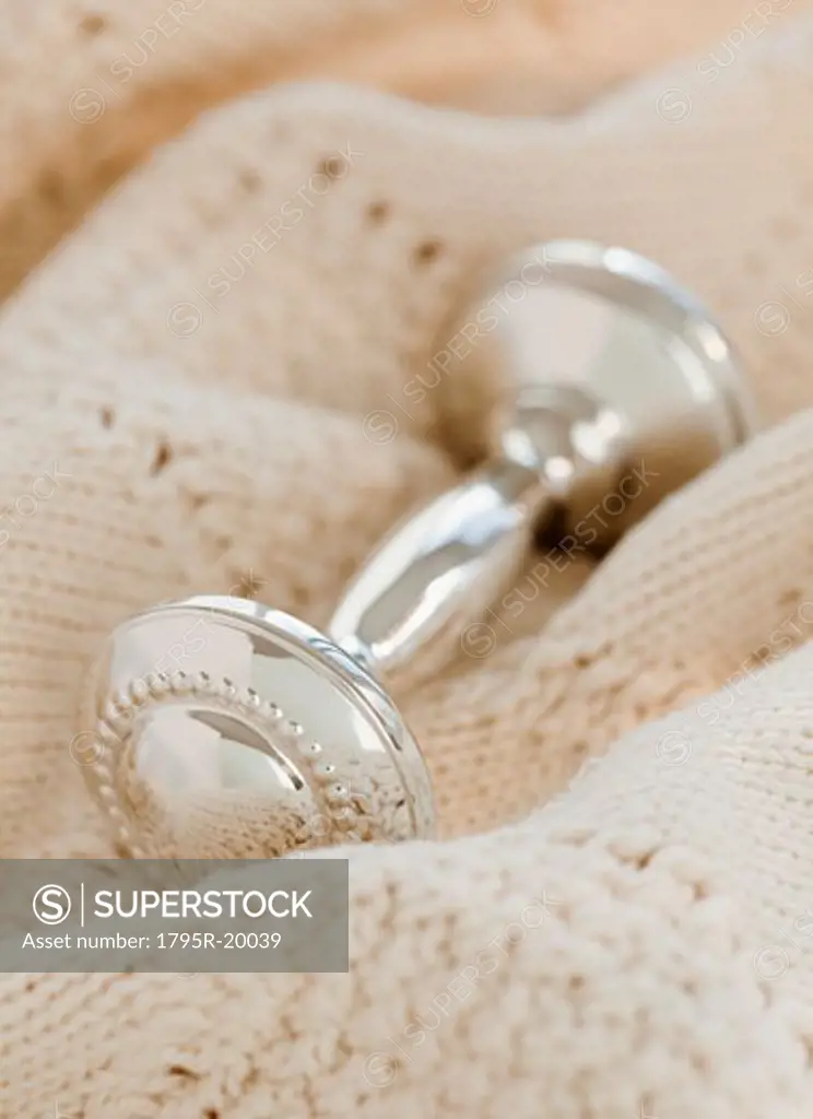 Close-up of silver baby rattle