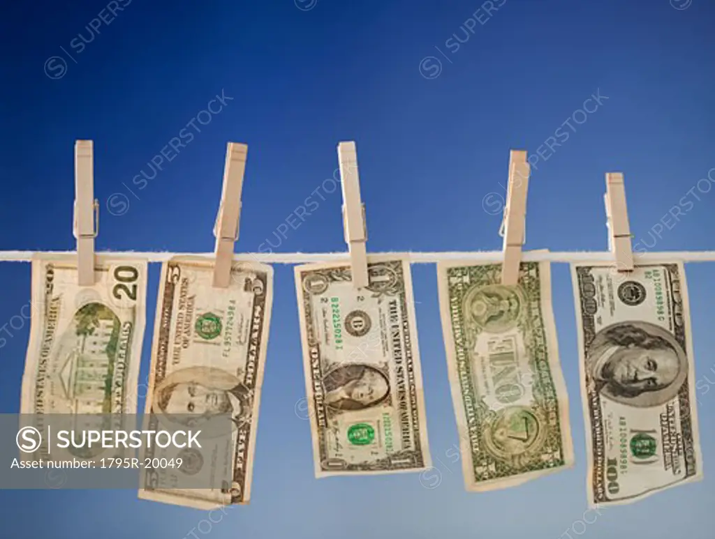 Money drying on clothesline