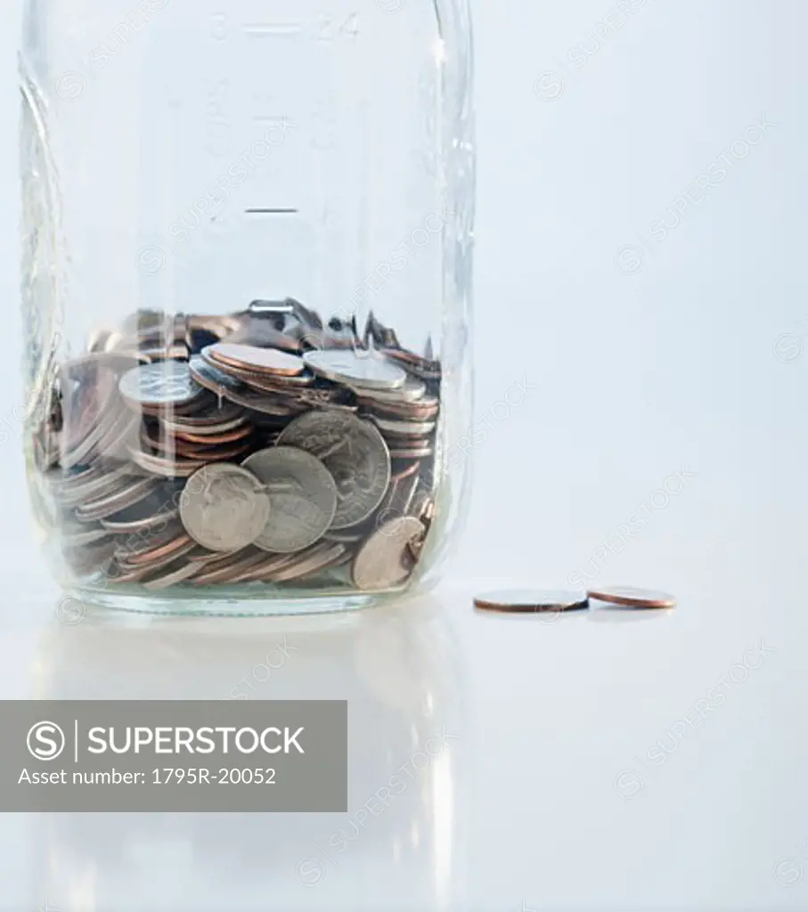 Coins in savings jar