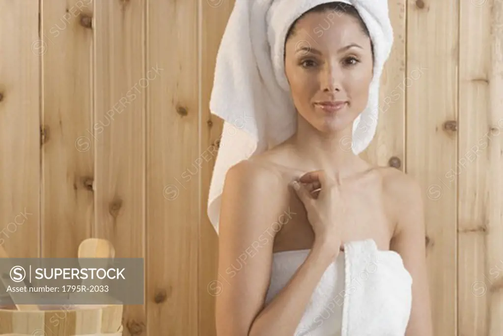 Smiling woman in sauna