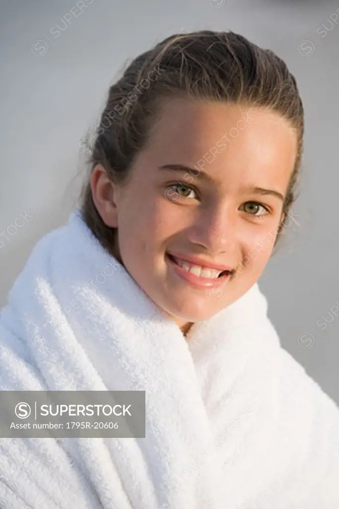 Portrait of girl wrapped in a towel