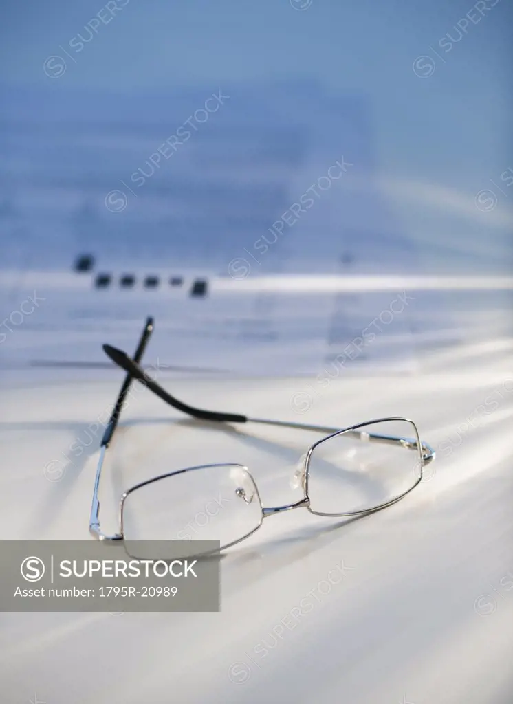 Eyeglasses near some paperwork
