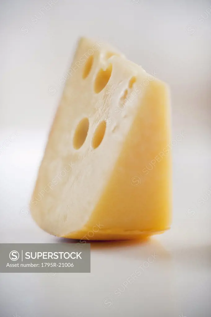 A piece of gruyere cheese