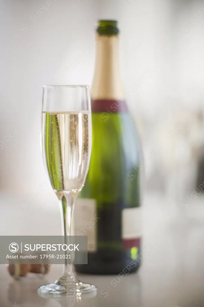 Champagne flute and bottle
