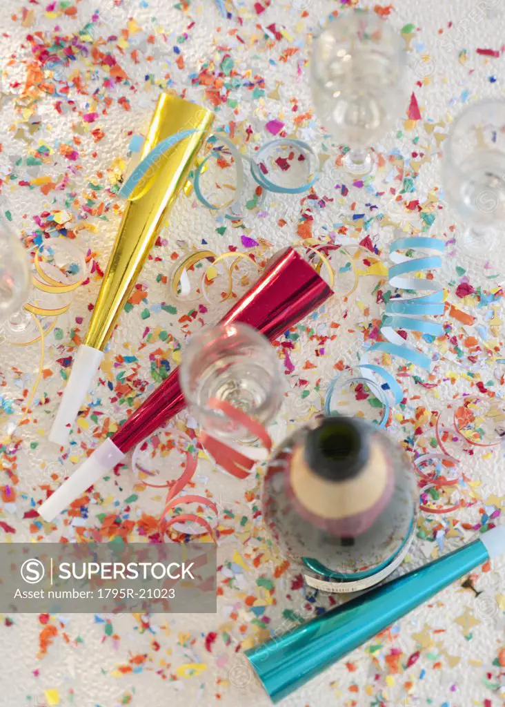 Champagne bottle and party supplies
