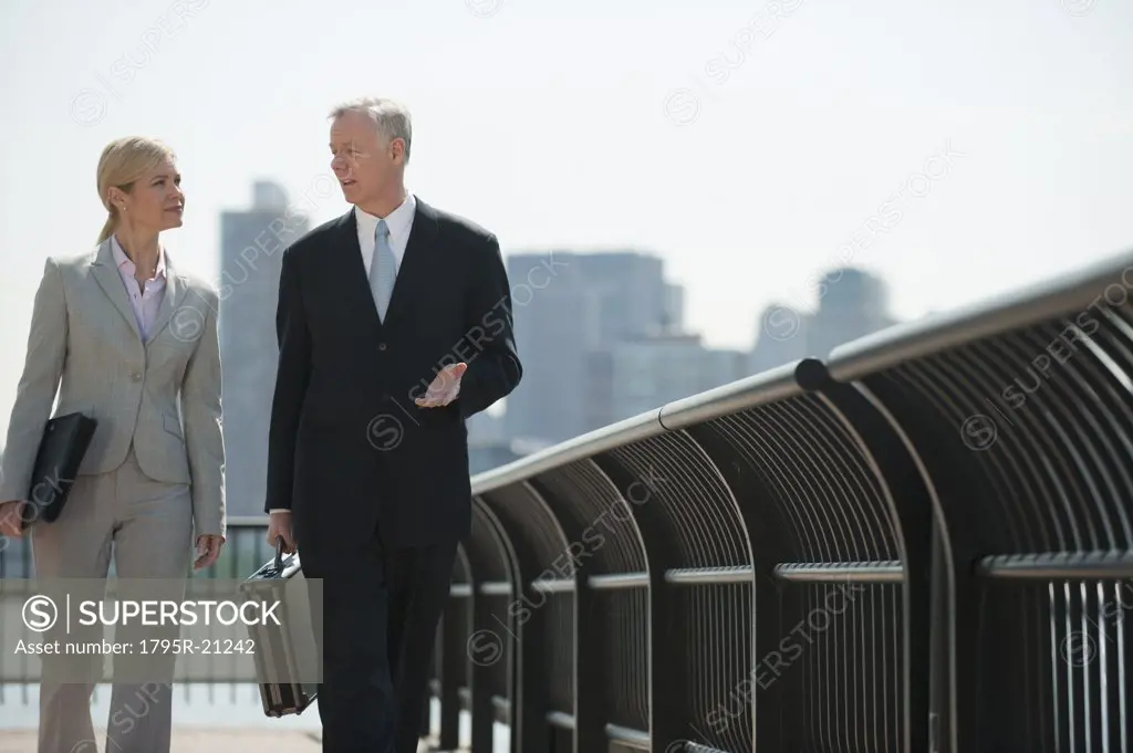 Two business people walking outdoors