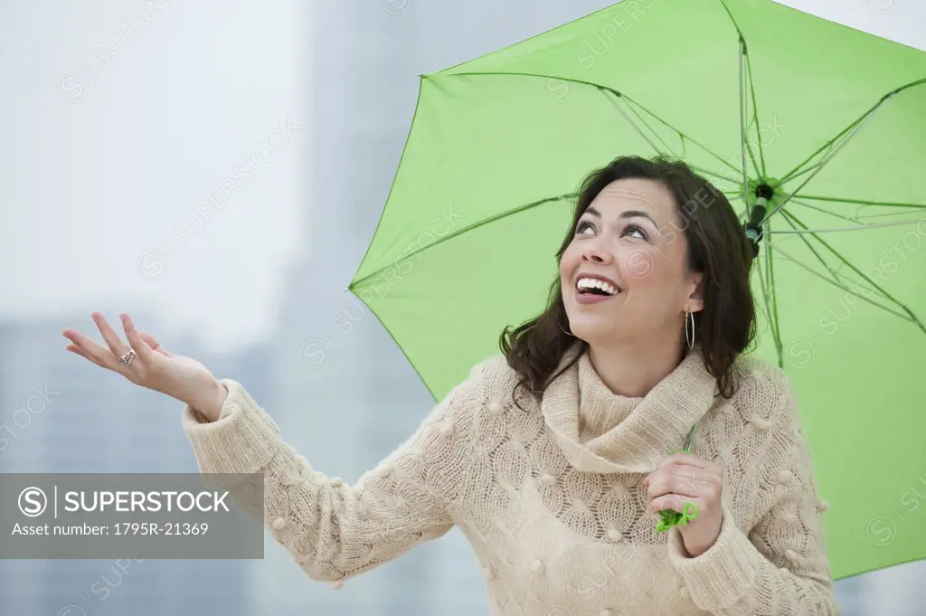 A woman outdoors in the rain