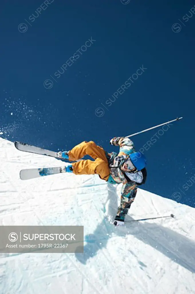 A downhill skier doing a trick