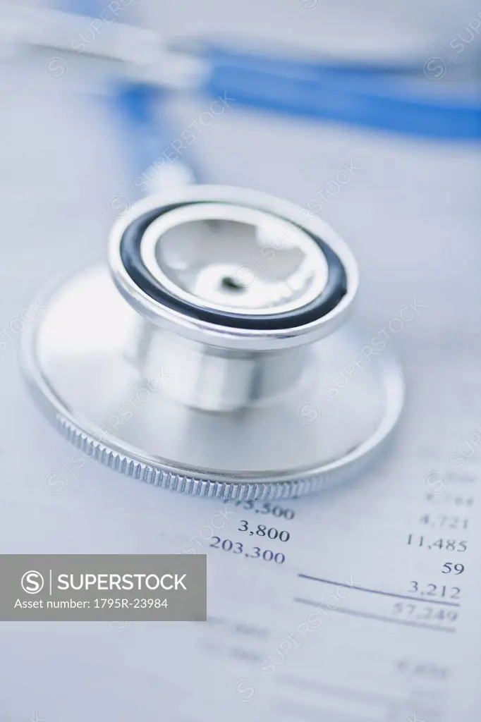 Stethoscope on finance papers