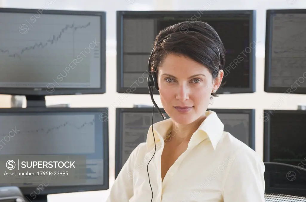 Female trader looking at camera