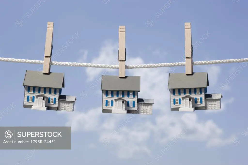 Symbolic houses on clothes line