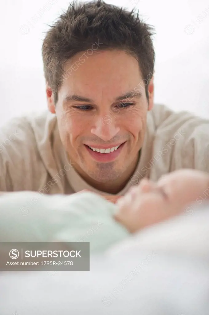 Father smiling at baby