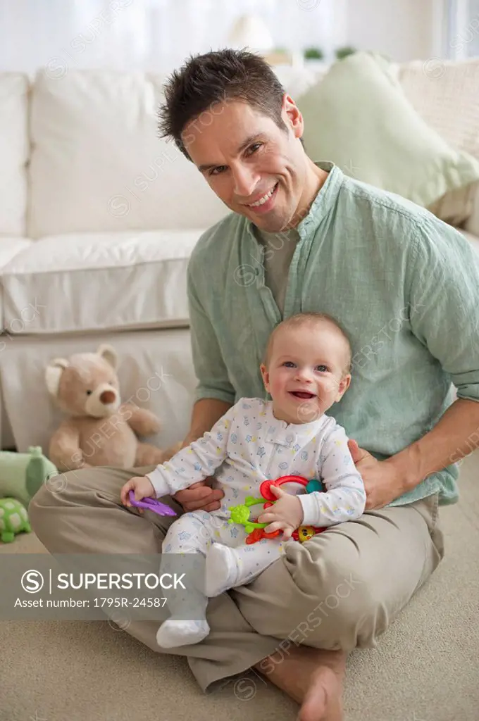 Father sitting with baby