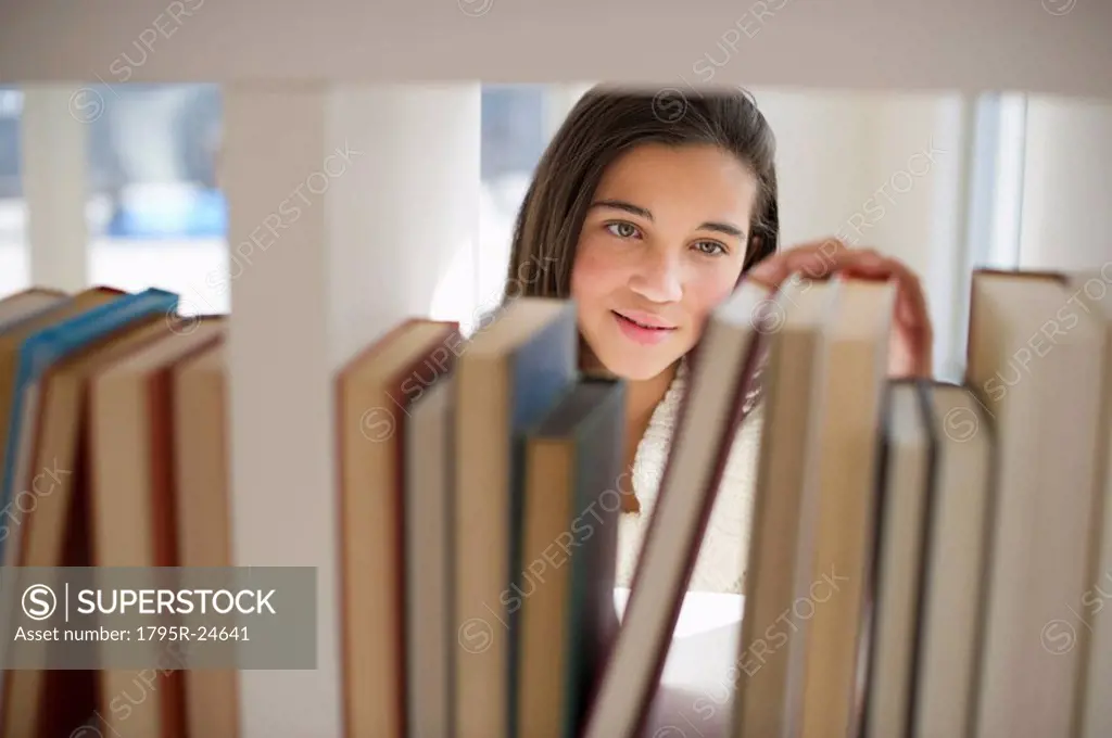 Student selecting book