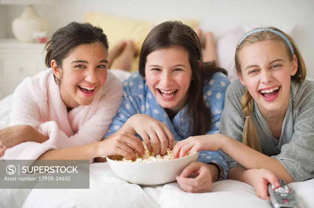 Girls eating popcorn