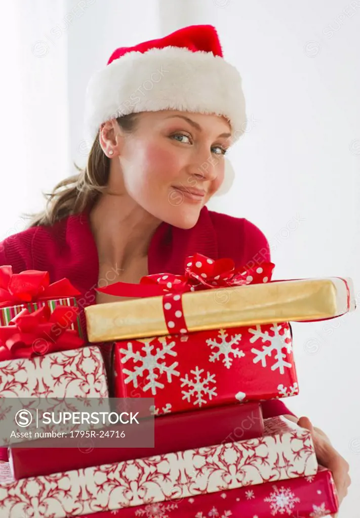 Woman holding Christmas presents