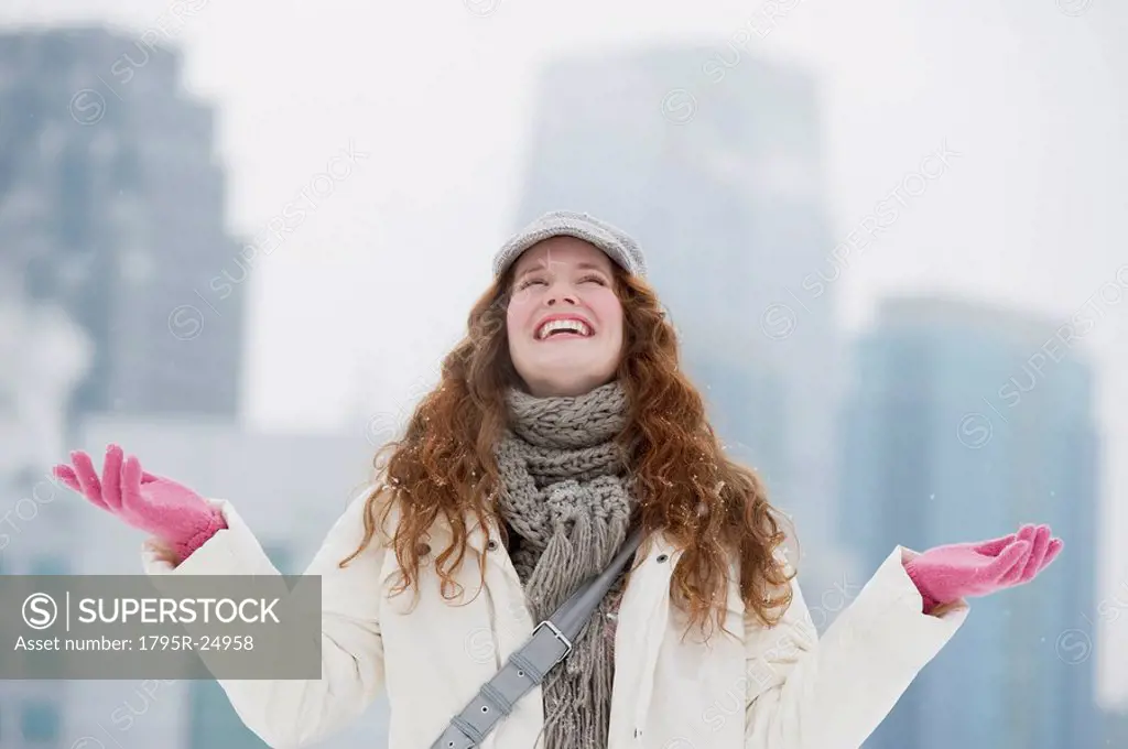 Woman enjoying a snowy day