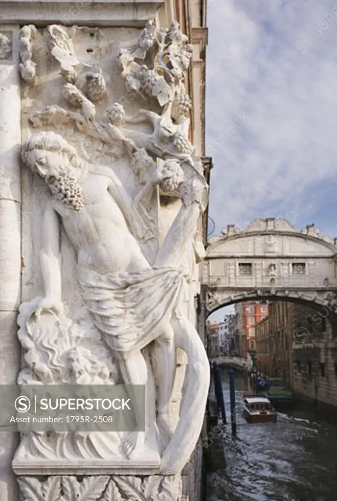 The Bridge of Sighs with sculpture depicting Drunkenness of Noah Doge's Palace Venice, Italy