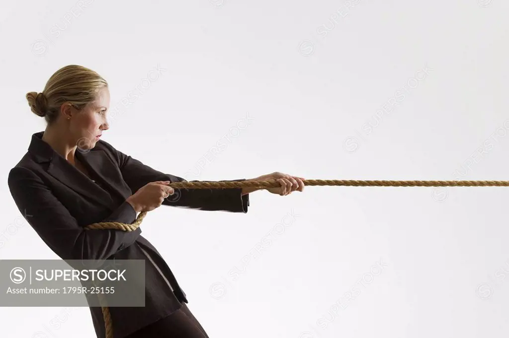 Woman pulling a rope