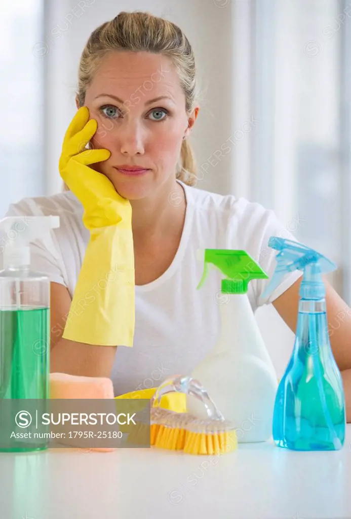 Woman and cleaning supplies