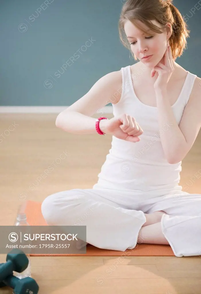 Woman checking her pulse