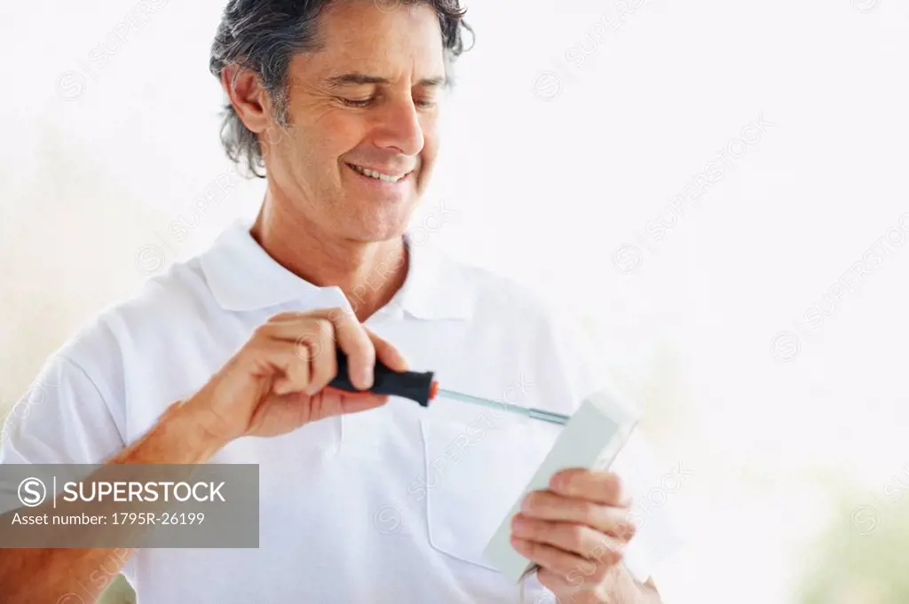 Man using screwdriver