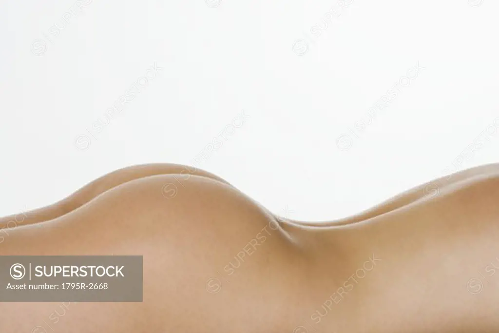Closeup of nude female posterior