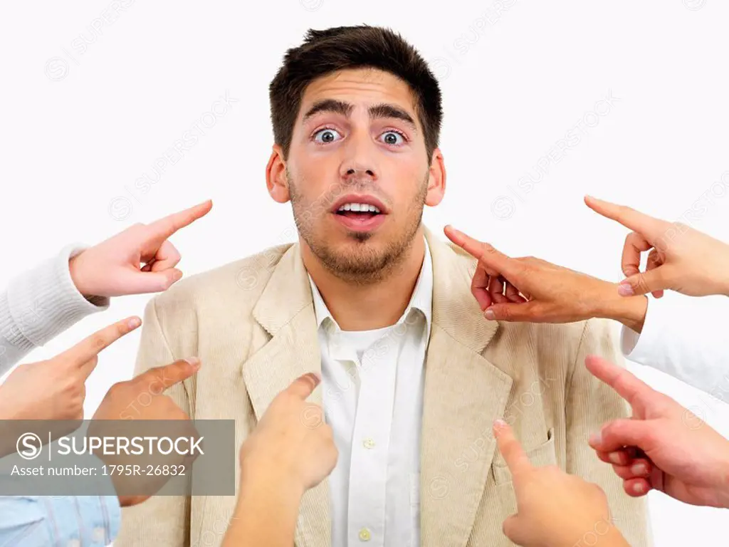 Hands pointing at man