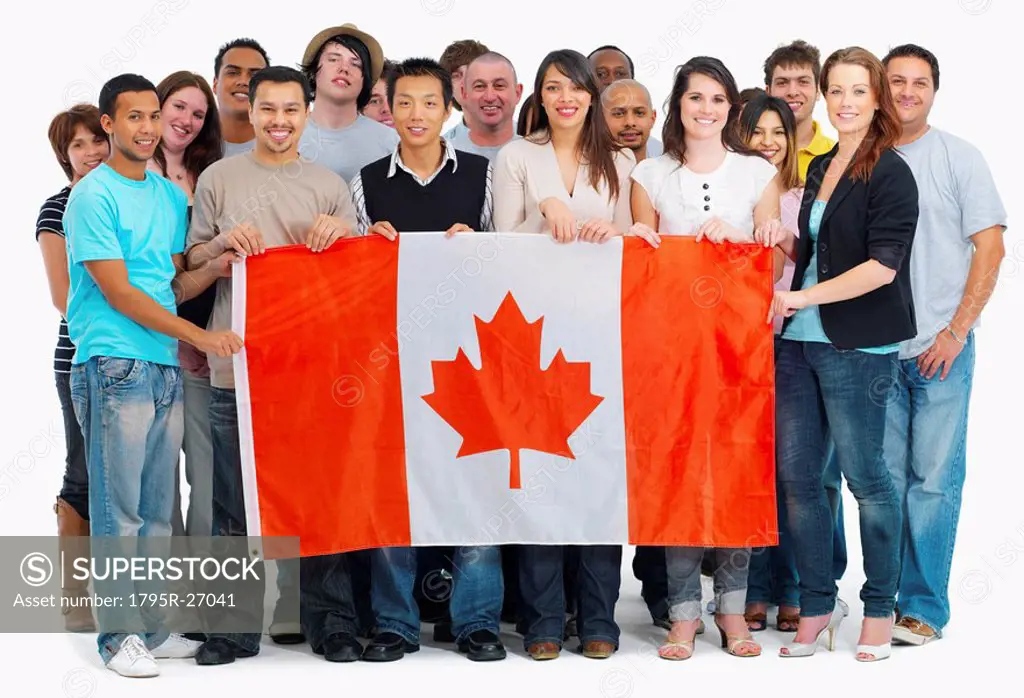 Group of people holding Canadian flag