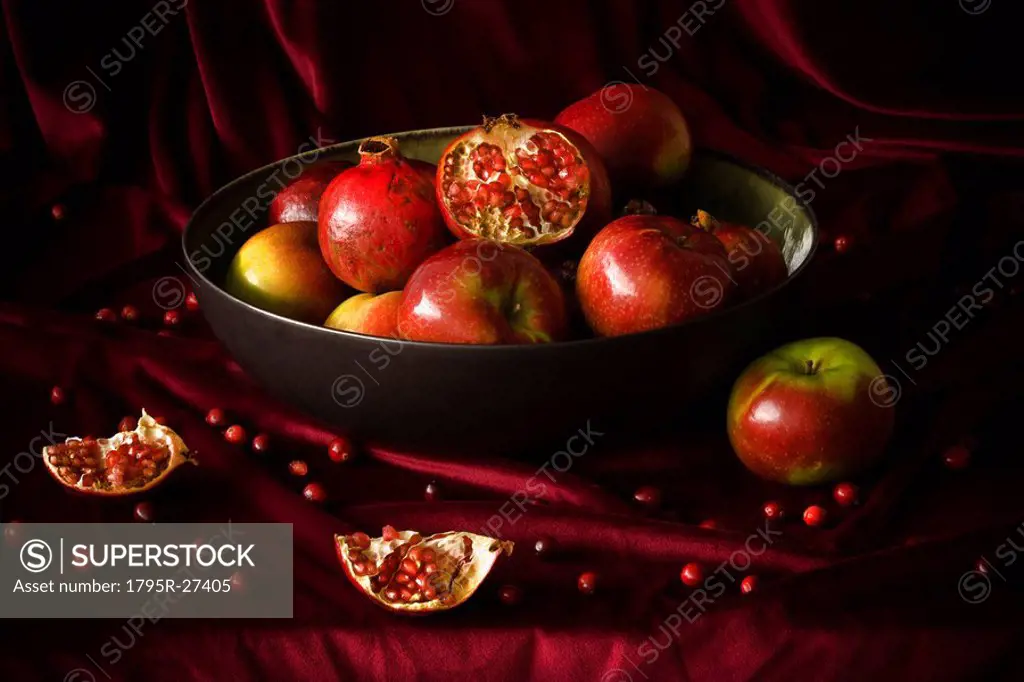 Bowl of pomegranates and apples