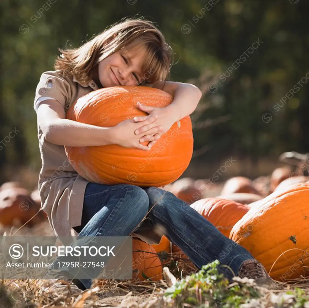 Girl in pumpkin patch