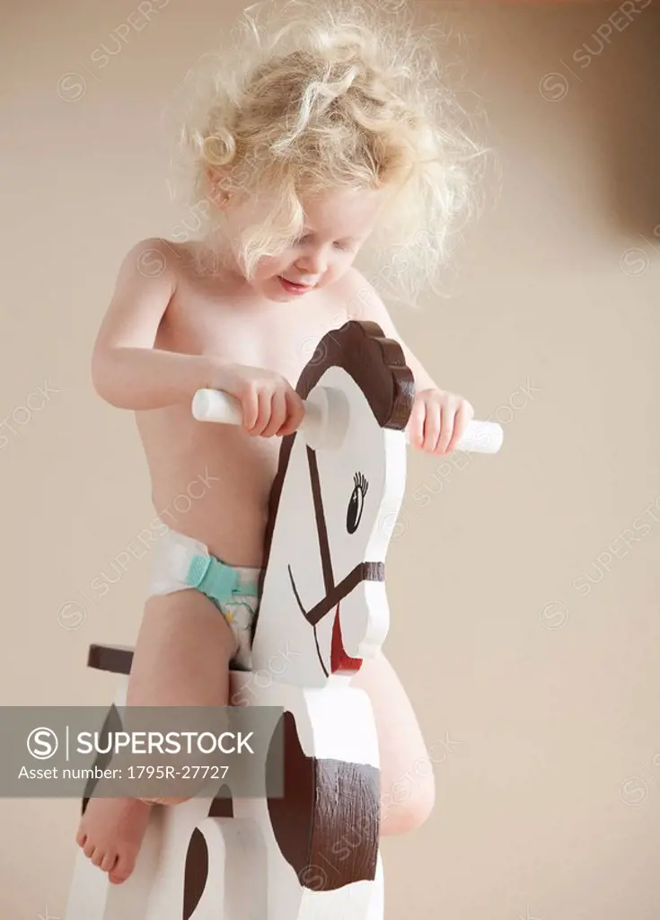Toddler on rocking horse