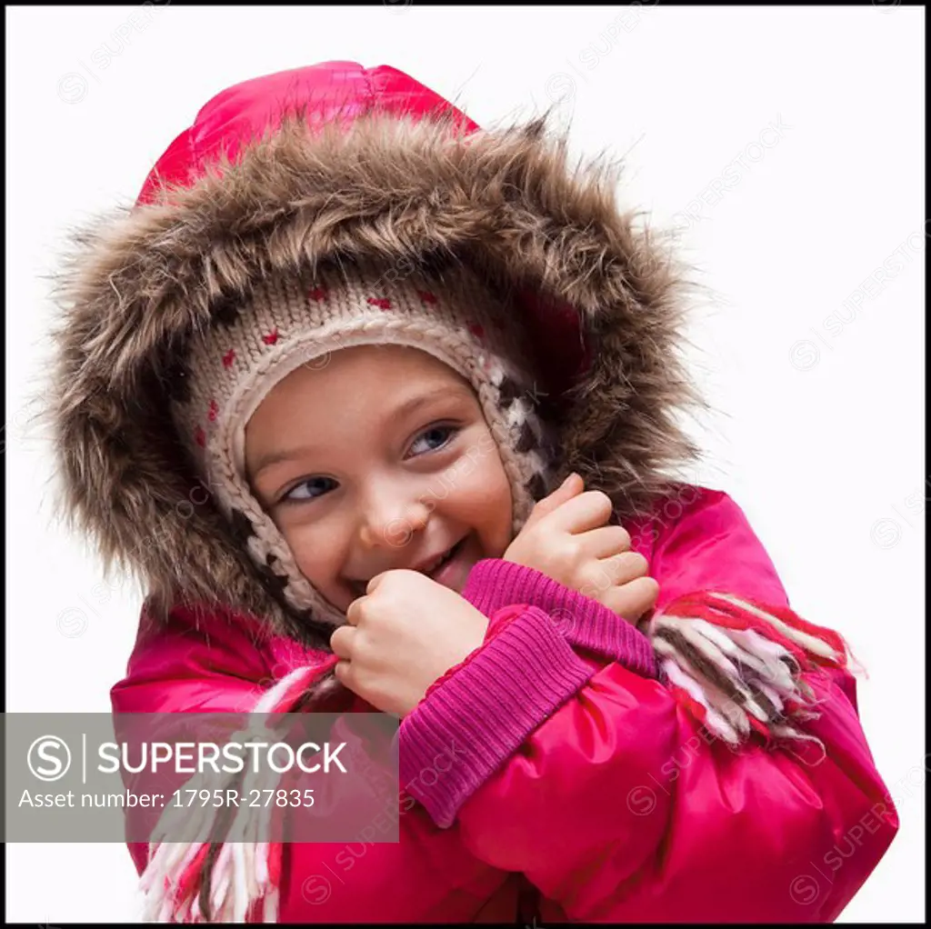 Young girl wearing winter clothing