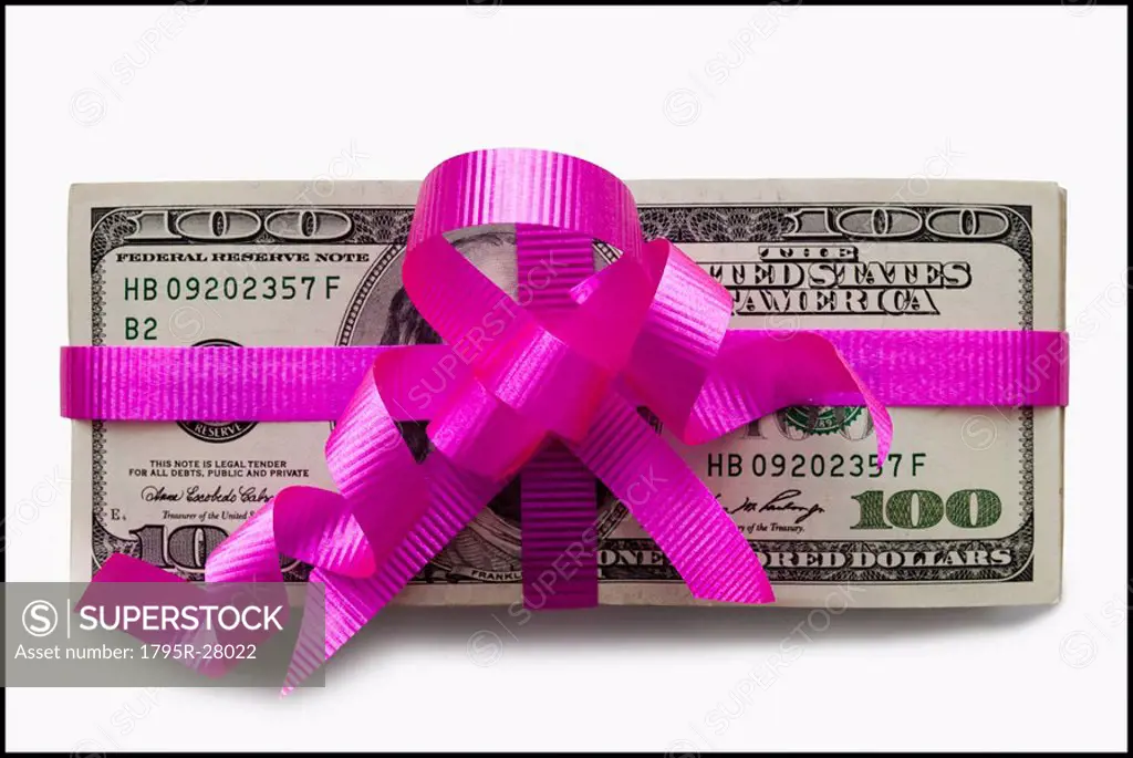 American currency tied with a pink bow