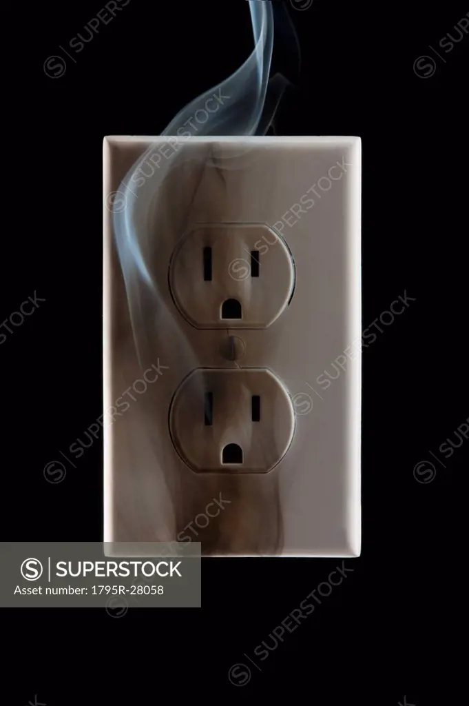 Smoke emanating from an electrical outlet