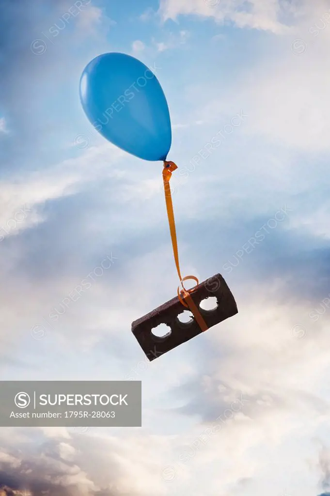 Balloon tied to a brick