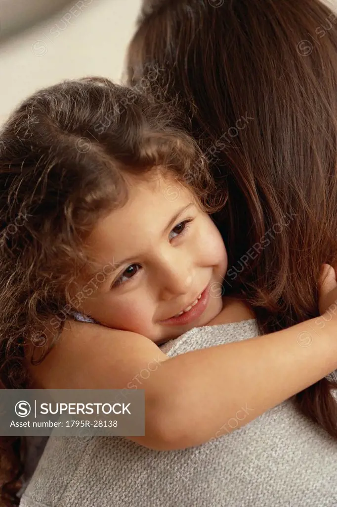 Child embracing mother