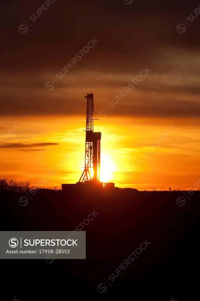 Silhouette of a drill rig