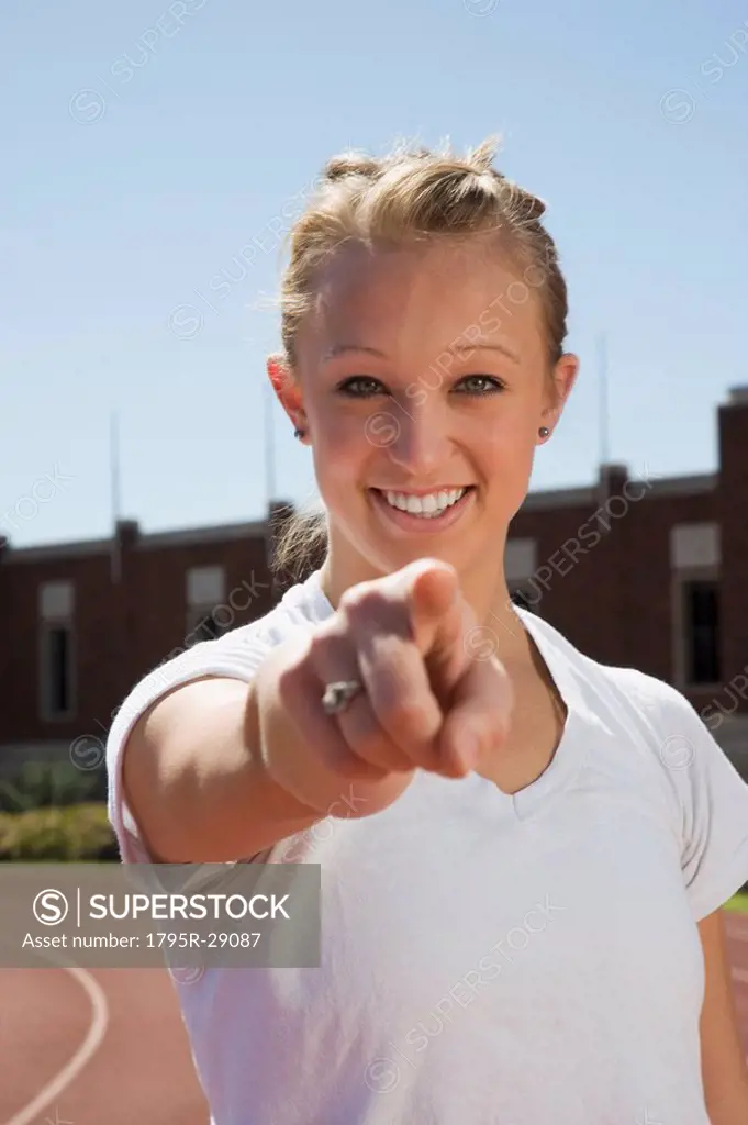 Teenage girl pointing her finger