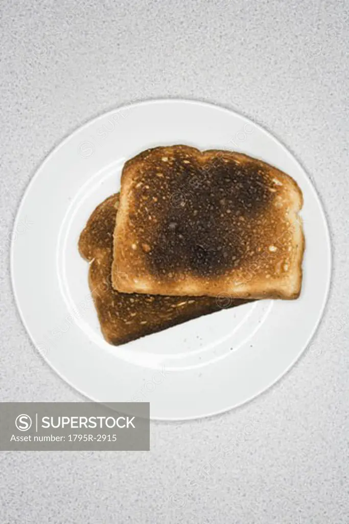 Burned toast on plate