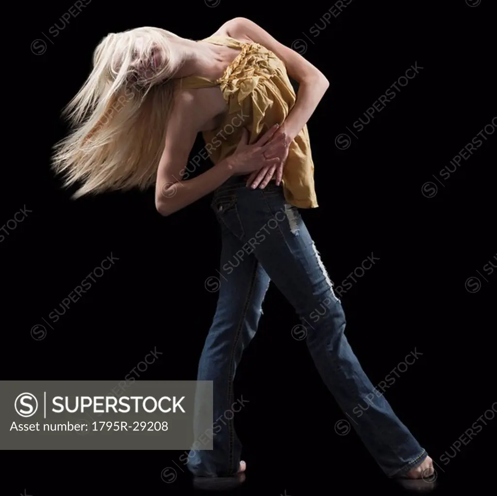 Blond woman dancing